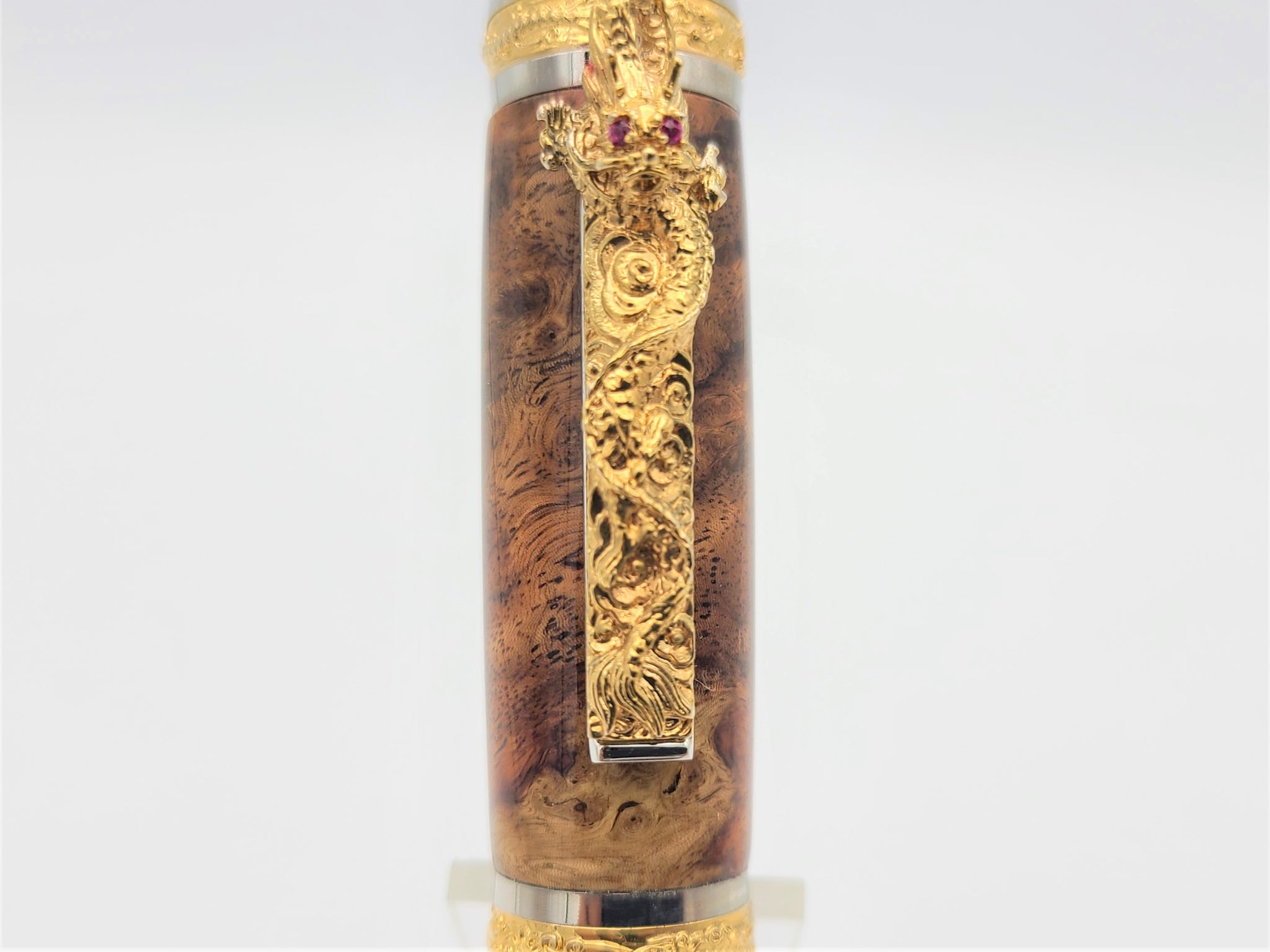 Golden retailer Dragon in Amboyna burl